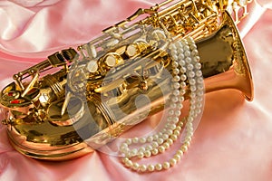 Saxophone and Pearl necklace