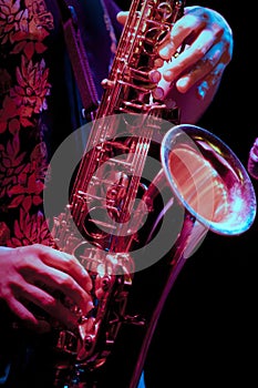 Saxophone player in live perfomance photo