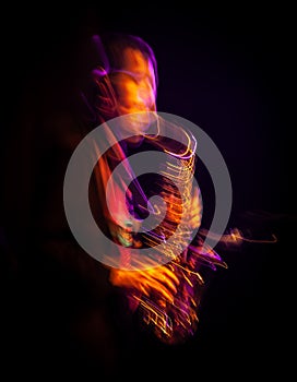 Saxophone player performing on stage