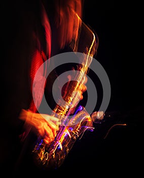 Saxophone player performing on stage