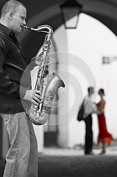 Saxophone Player With Romantic Couple