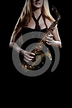 Saxophone player. Saxophonist woman Sax player