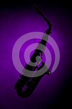 Saxophone Silhouette Isolated on Purple