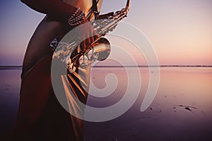 Saxophone water melody photo