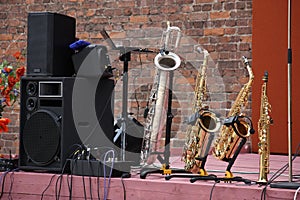 Saxophones abreast.