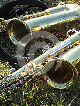 Saxophones on grass during marching band practice