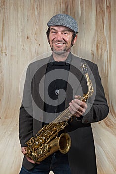 Saxophonist with hat on a break