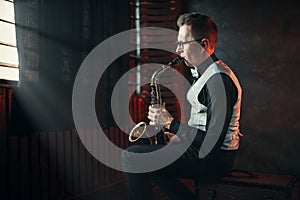 Saxophonist playing jazz melody on saxophone