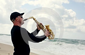 Saxophonist playing on saxophone outdoor