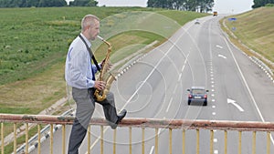 A saxophonist plays the saxophone