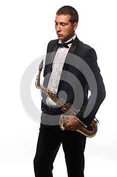 Saxophonist in suit with tie