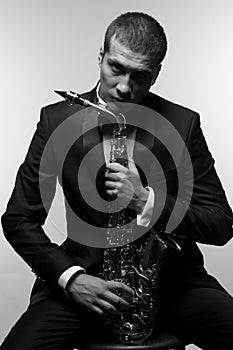 Saxophonist in tuxedo BW