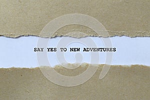 say yes to new adventures on white paper