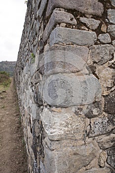 Saywite or Sayhuite is an archaeological zone located in Peru, stone background of the pyramid ruins photo