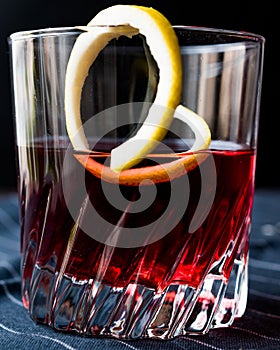 Sazerac Cocktail with lemon peel.