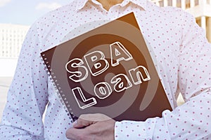 SBA Loan is shown on the conceptual business photo photo