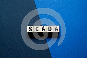 Scada word concept on cubes