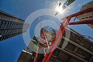 Scaffoldiing climbing up the side of a building.