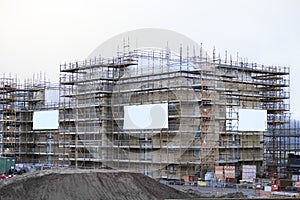 Scaffolding Around Construction Of Residential Building