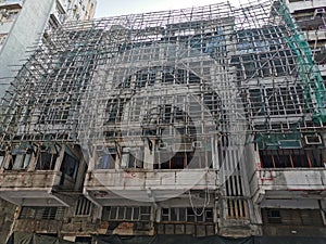 Scaffolding building Hong Kong Kowloon Sham Shui Po, to be demolished and redevelop