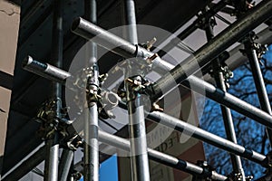 scaffolding on a construction site, detail of the scaffolding structures made of galvanized steel joints and structures