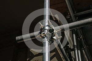 scaffolding on a construction site, detail of the scaffolding structures made of galvanized steel joints and structures