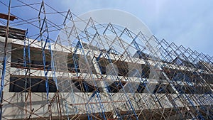 The scaffolding in construction work in progress