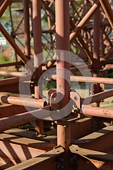 Scaffolding Elements Construction. Metal scaffolding tubes and bars. Construction site details. Bridge support. Industrial.