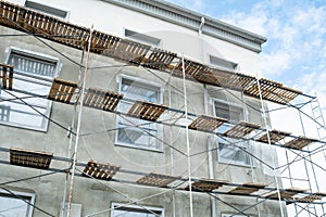 Scaffolding on the facade of a building under construction