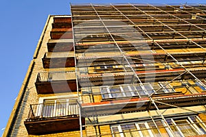 scaffolding before installation of the thermal insulation of the facade