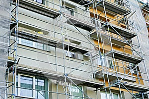 Scaffolding before installation of the thermal insulation of the facade