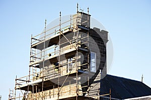 Scaffolding installed at old church building high level
