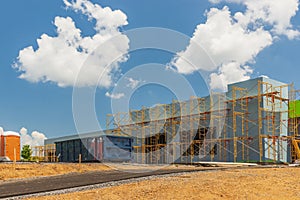 Scaffolding In Place For Bricklayers At New Commercial Construction Site photo