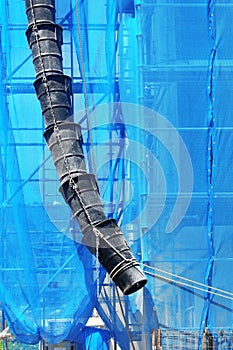 Scaffolding with rubbish waste chute