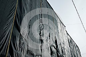 Scaffolding and safety net at residential building