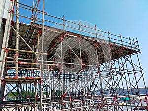 scaffolding with sky background. Concept for the construction of industrial plants.