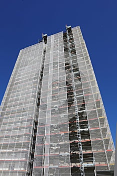 Scaffolding of the tallest skyscraper during maintenance work photo