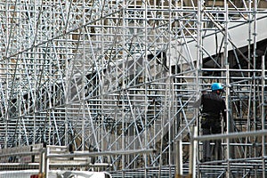 Scaffolding and worker photo