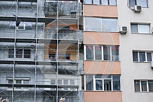 Scaffoldings on the facade of a block of flats