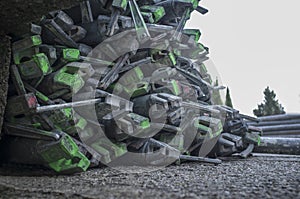 Scaffolds elements piled at old town construction site