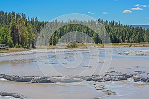 Scalding water flowing in a thermal desert at Upper Geyser Basin in Yellowstone National Park, Wyoming