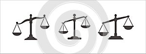 Scale of justice icon vector set. Leaning on one side scale of justice symbol illustration. Unfair law court symbol icon
