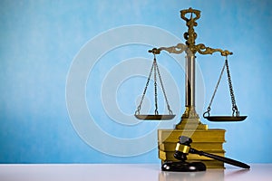 Scale of justice. Wooden judge`s gavel. The criminal law.