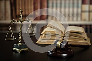 Scale of justice. Wooden judge`s gavel. The criminal law.