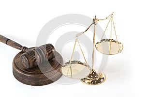 Scale of justice. Wooden judge`s gavel. The criminal law.