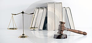 Scale of justice. Wooden judge`s gavel. The criminal law.