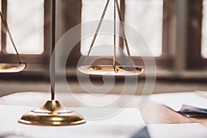 Scale law. businessman sitting office working contract papers on wood table. Selective Focus