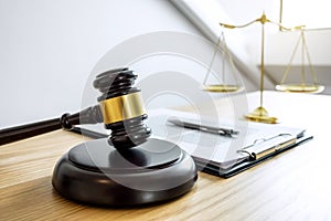 Scales of justice and Gavel on sounding block, object and law bo