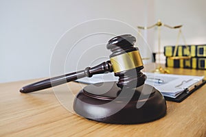 Scales of justice and Gavel on sounding block, object and law book to working with judge agreement in Courtroom, Justice and Law