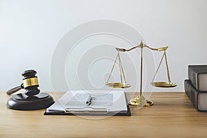 Scales of justice and Gavel on sounding block, object and law book to working with judge agreement in Courtroom, Justice and Law